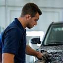 Expert technician working on a car